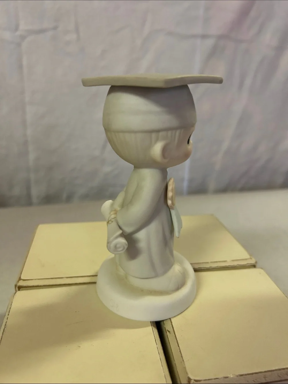 Precious Moments Porcelain Graduate Figurine in White and Pastel Pink